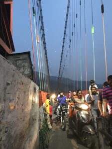 The narrow Lakshman Jhoola bridge on Ganges © Jasmine White London