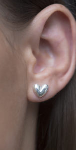 Jasmine White London Sterling silver heart shaped ear studs.